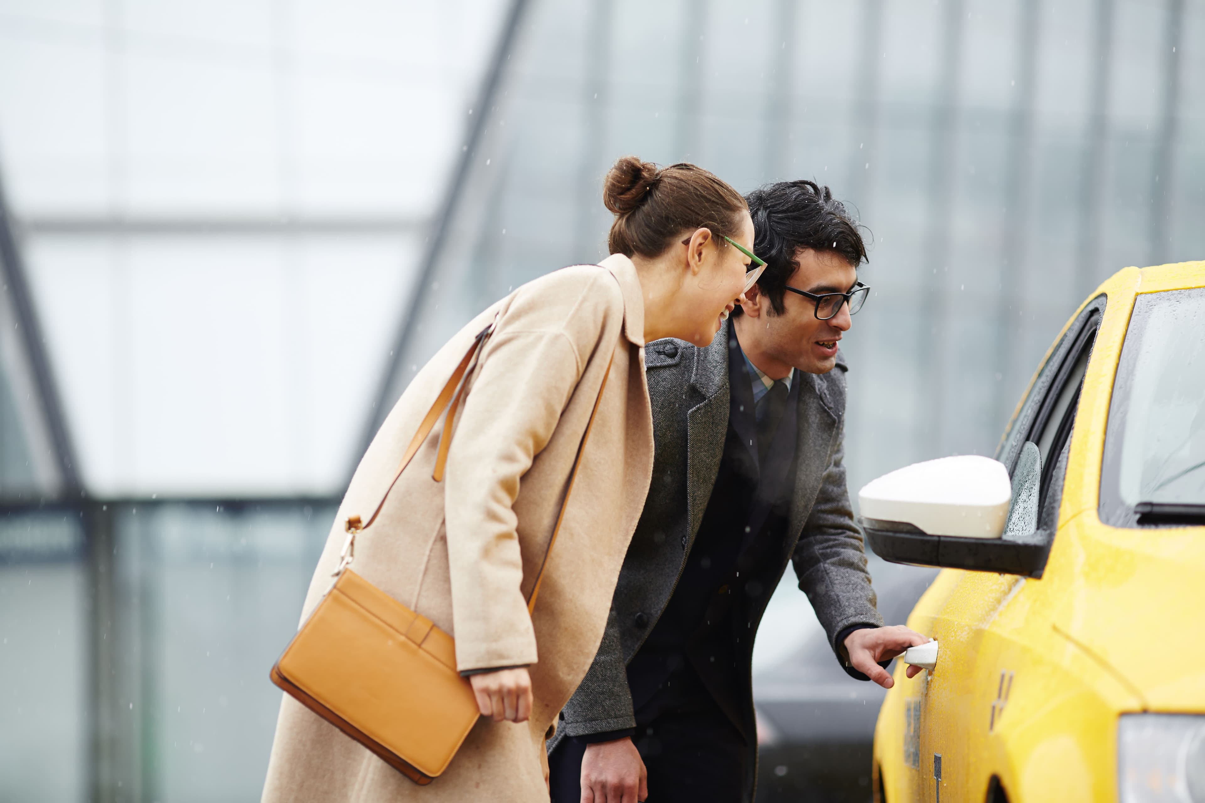 Travelers arriving in a city for private airport transfer
